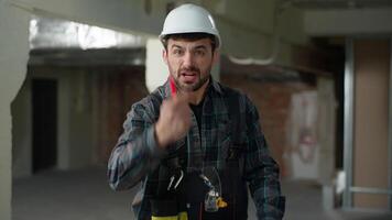 Angry mad furious anger man Caucasian guy builder arguing conflict male engineer shout problem building construction quarrel annoyed foreman handyman architect screaming shouting trouble industrial video