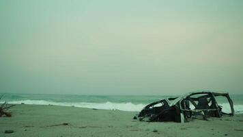 Near The Ocean A Car Destroyed By Bomb On The Beach video
