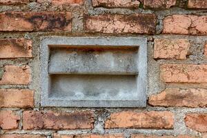 Brick Wall Texture with Concrete Block Inset Detail photo