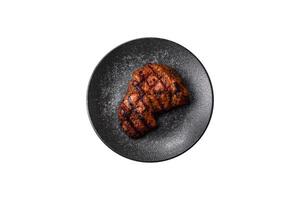 Meat, juicy beef steak on a white background photo