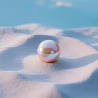 Single iridescent pearl resting on soft undulating white sand dunes under a blue sky photo