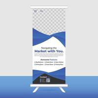 a roll up banner with a blue and white design vector