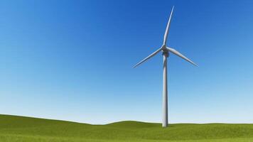 A wind turbine on a grassy hill with a blue sky video