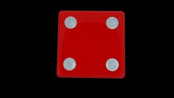A red dice with four white dots on it video