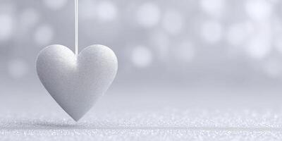 White textured heart ornament hanging delicately against a soft blurred background, creating a serene and romantic atmosphere for various design applications and heartfelt expressions photo