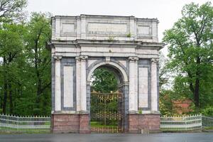 Pushkin, Russia, June 30 2025. Orlovs Gates , Gatchinskie of Catherine Park. Gate was built according to design of Rinaldi in 1772 in honor of victory over plague epidemic in Moscow in 1771 photo