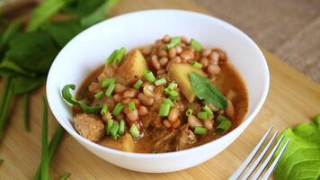 Bean and potato stew in a bowl video