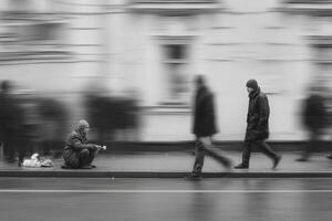 Blurred image of homeless man on the street photo