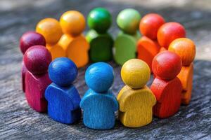 Colorful wooden figures forming a circle on a rustic surface photo