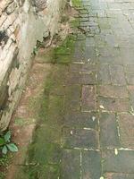 ancient walkway by brick in temple background photo