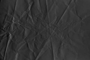 Rough Dark Background with Torn Paper Texture photo