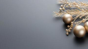 Christmas composition featuring golden baubles and fir branches on a dark background, creating a festive atmosphere photo