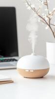 White aromatherapy diffuser releasing a fragrant in sunlit a mist room, promoting relaxation and wellness photo