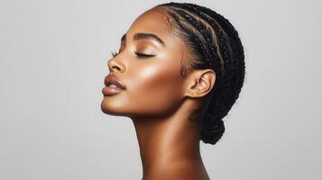 voluminous woman with radiant curls posing confidently, displaying Young complexion and elegant studio lighting photo