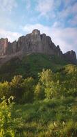 Bolshoy Tkhach mountain in summer with sunlight. Caucasus video