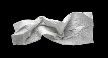 A folded white towel on a black background photo