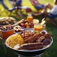 Delicious Grilled Food at a Summer Barbecue. A close-up shot of grilled sausages, corn, and bacon-wrapped skewers on a barbecue grill, with blurred people enjoying the outdoors in the background. photo