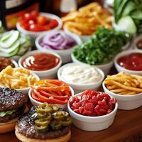 Gourmet Burger Bar Toppings and Sauces. A close-up image showcasing an array of fresh ingredients and condiments for burger customization. photo