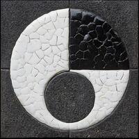 Abstract Black and White Craquelure Art Tile. A high-resolution image of a decorative tile featuring a unique cracked paint design in black and white. photo