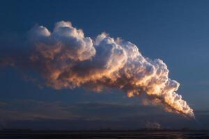 A large smoke stack is seen in the sky photo