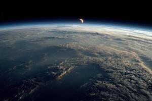 The earth from space with a moon in the sky photo