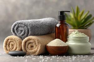 Towels, bath salts, and a jar of soap photo