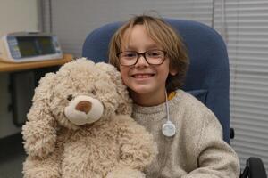 A boy with glasses photo