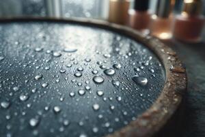 A round mirror with water droplets on it photo