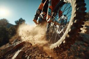 A dirt bike is riding on a rocky trail photo