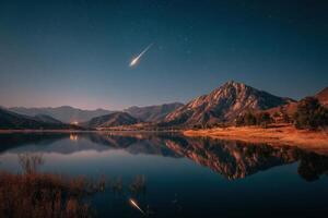 A shooting star is reflected in the water of a lake photo