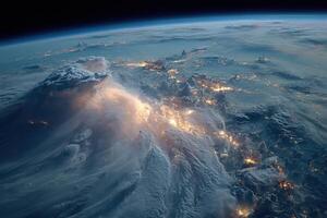 Earth at night with clouds and light photo