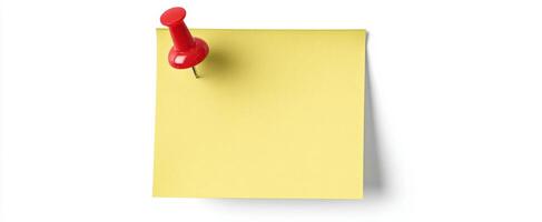The yellow sticky note with a red pushpin for reminders and messages. photo