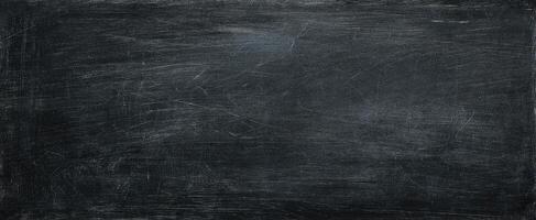 The textured black surface providing a perfect backdrop for creativity and design. photo