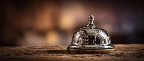 The shining bell on a rustic countertop in an elegant setting photo