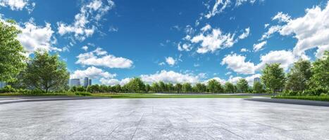The serene urban park under a vibrant blue sky with fluffy clouds. photo