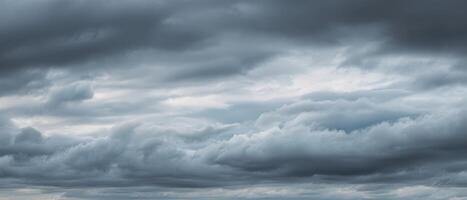 The Dramatic Clouds Overcast a Serene Horizon in a Moody Landscape. photo