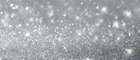 The shimmering silver background filled with sparkling glitter for events. photo