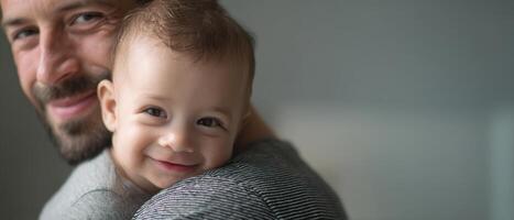The Father and Baby Sharing a Heartwarming and Joyful Moment Together photo