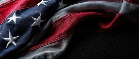 The Waving American Flag Displaying Rich Texture and Deep Colors photo