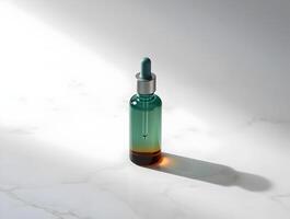 A green and brown liquid bottle sitting on a marble surface photo