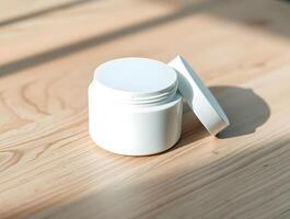 White jar with lid on wooden table photo