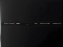 Dramatic Black Texture Torn Paper Abstract Background photo