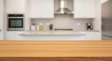 A wooden table in front of a kitchen photo