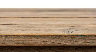 A close up of a wooden table with a hole in it photo
