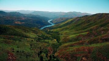 Fly Above Stunning nature with mountains and river in the middle video