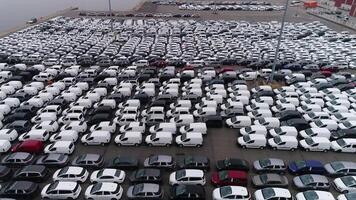 Aerial View of Car Factory Parking Lot with Many New Cars for Sale video