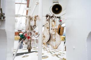 Close up view of a ship utils with ropes,,. photo
