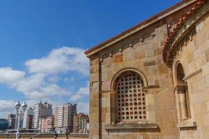church at the beach of gijon photo