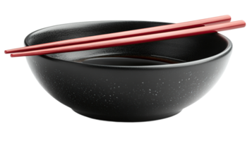 Dark bowl of soy sauce with chopsticks png