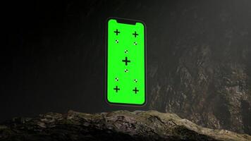 Animation of Smartphone with Green Chroma Key Screen Inside a Dark Cave video